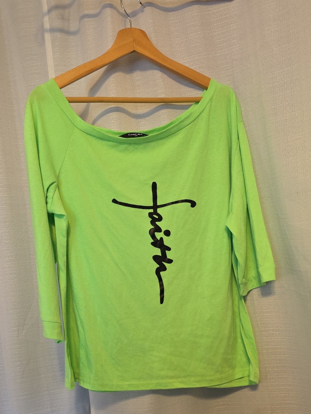 chic Neon Green Boatneck Top with Black Script Graphic